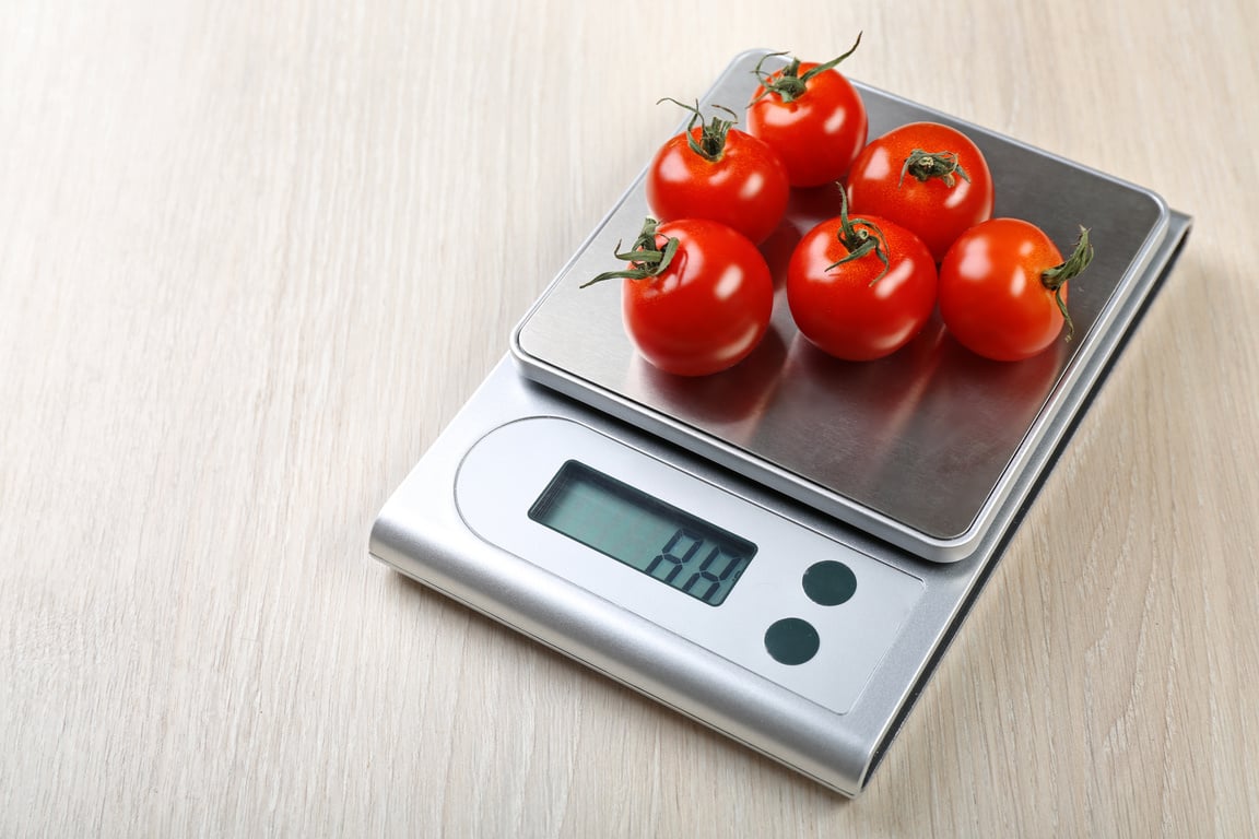 Tomatoes on Digital Kitchen Scale